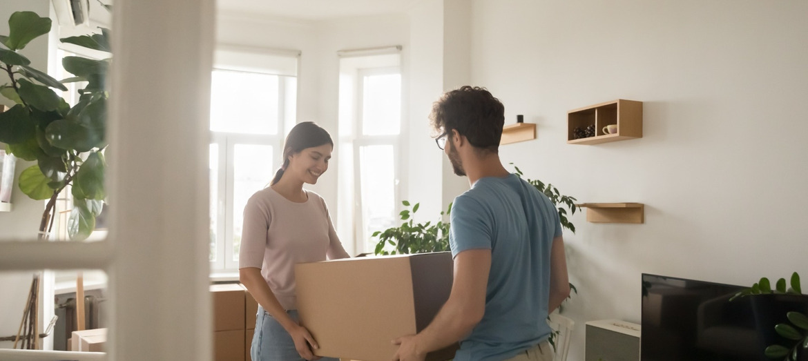 A couple moving into their first home.